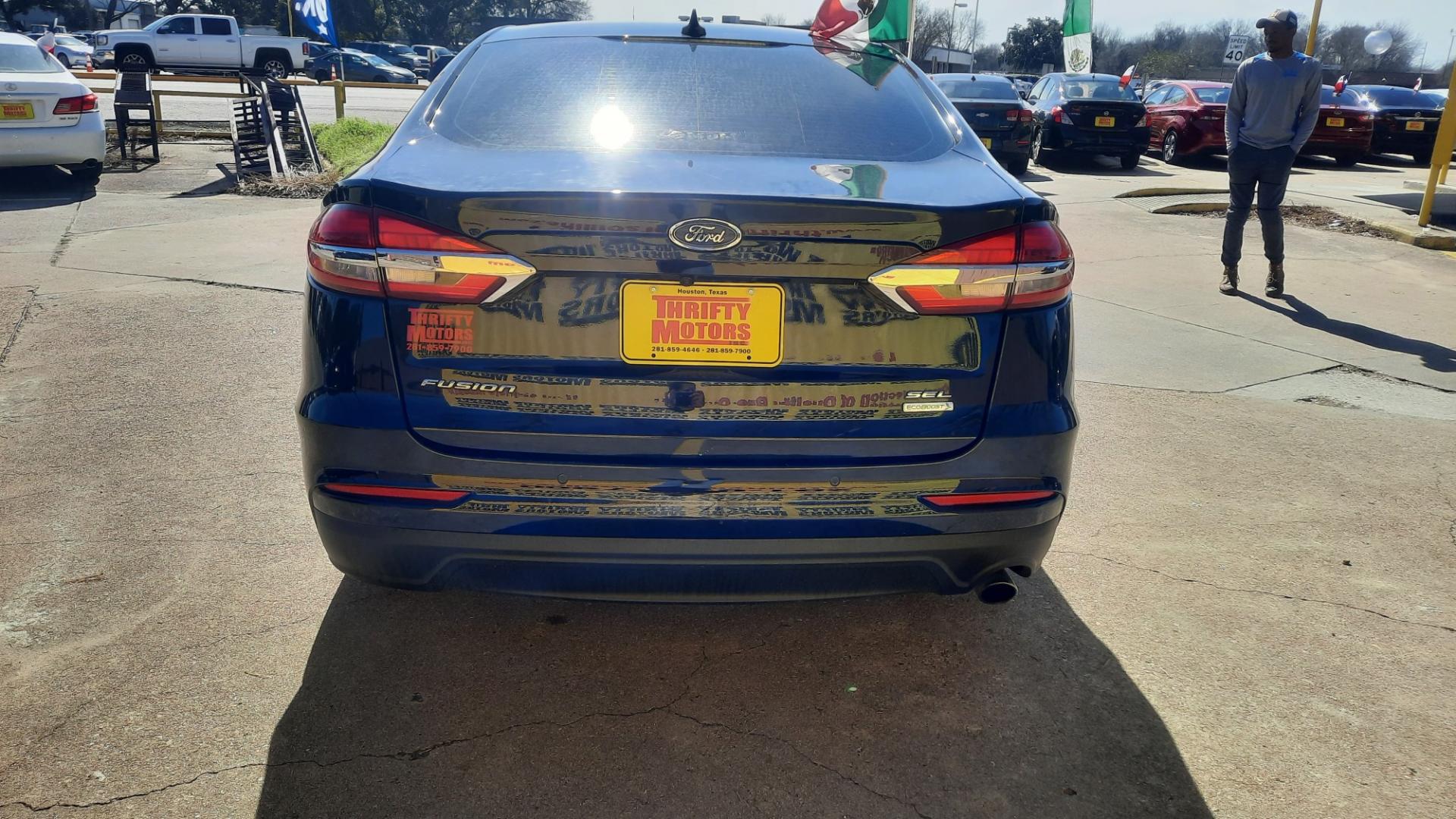 2019 Ford Fusion (3FA6P0CD3KR) , located at 16710 Clay Rd., Houston, TX, 77084, (281) 859-7900, 29.834864, -95.656166 - Photo#2